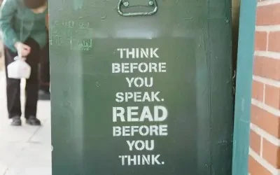 Stock image of a book cart with print "Think before you speak. Read before you think.
