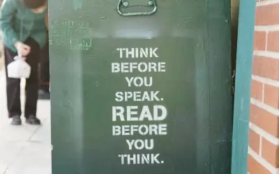 Stock image of a book cart with print "Think before you speak. Read before you think.
